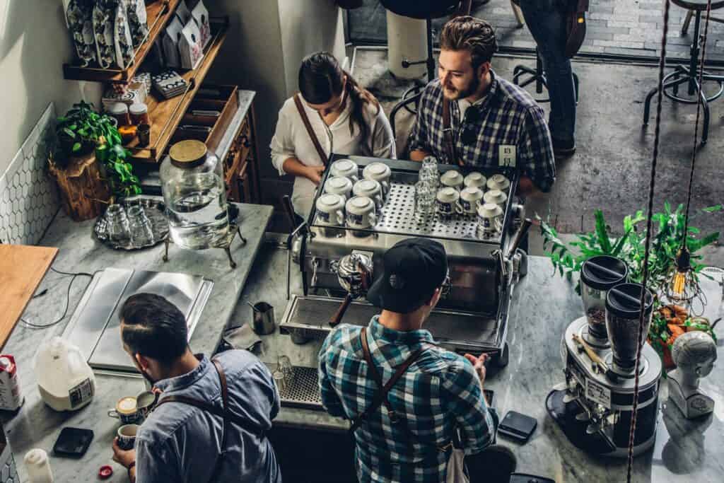 Man buying coffee at a counter
